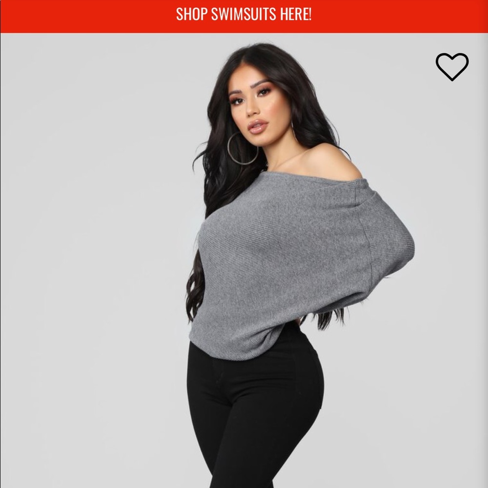 Super cute off the shoulder sweater.